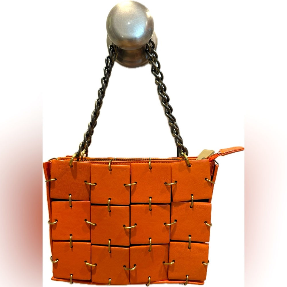 Trina Turk orange bronze chain woven pieced evening bag